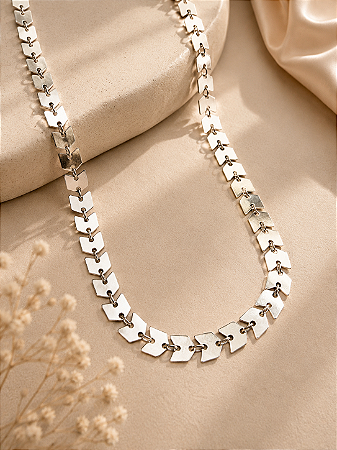 Chocker escamas