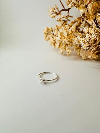 Piercing argola lisa com ponto de luz