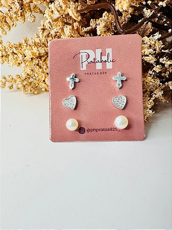 Brinco trio pérola, coração cravejado, cruz com ponto de luz