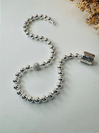 Pulseira inspiração Pandora bolinha com bola cravejada fecho tambor