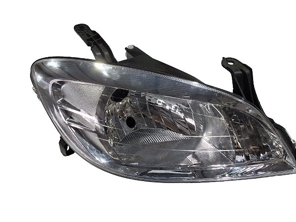 Farol Lado Direito Celta com detalhes Prisma 2007 até 2013 Lado Direito Novo de Época