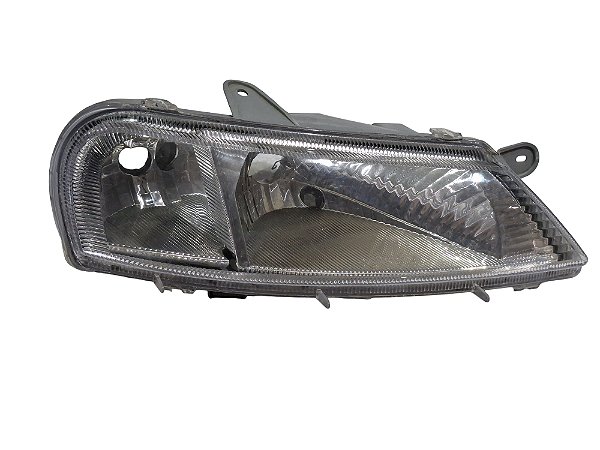 Farol Lado Direito GM Celta 2000 até 2006 Marca Orgus