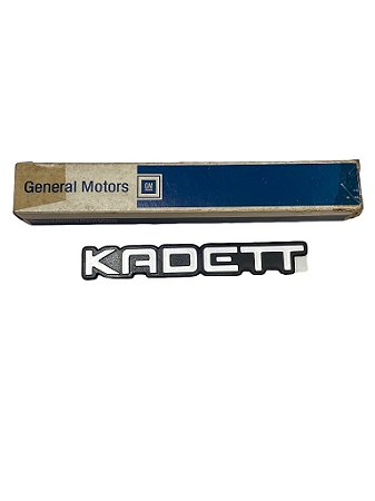 Emblema da Tampa Traseiro Porta-Malas do GM Kadett de 1994 a 1997 Original GM 93224665 Novo de Época