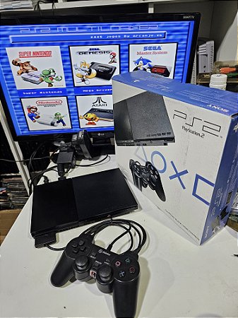 Ps2 com leitor 1 controle, cabos e caixa paralelos