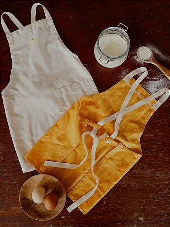 Avental infantil cru