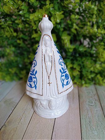 Imagem de Nossa Senhora Aparecida em Porcelana com Filete de Ouro e Flores