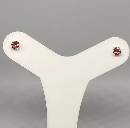 Brinco ponto de luz rosa