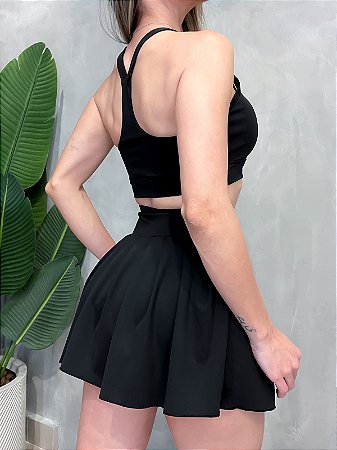 Conjunto Fitness em Poliamida Top Nadador e Shorts Saia Plissado Camila