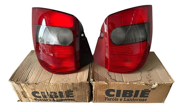 Par Lanterna Traseira Fumê Palio G1 96 / 00 Cibie Logo Fiat Ambos Lados Fumê