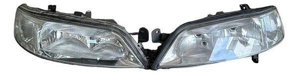 Par Farol Gm Vectra 00/05 Original Cibié P/ Motor Elétrico Ambos Lados