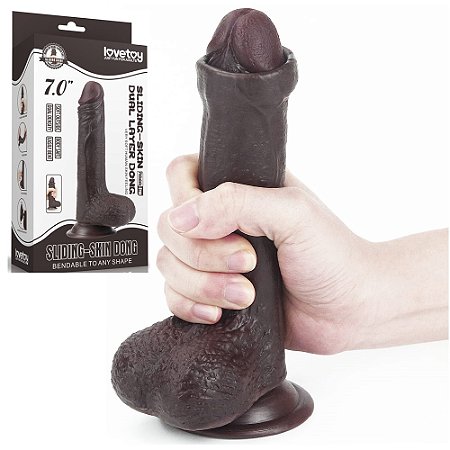 LOVETOY SLIDING SKIN 7.0'' - PRÓTESE REALÍSTICA BELISCÁVEL COM GLANDE DEFINIDA, VÉRTEBRA, VEIAS SUAVES, ESCROTO E VENTOSA - 18 X 3,5 CM - COR CHOCOLATE