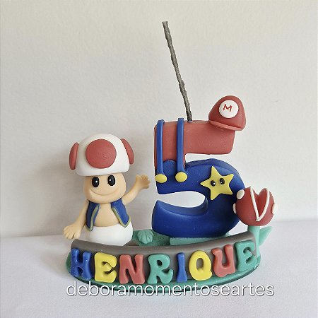 Topo de bolo com vela super mario game