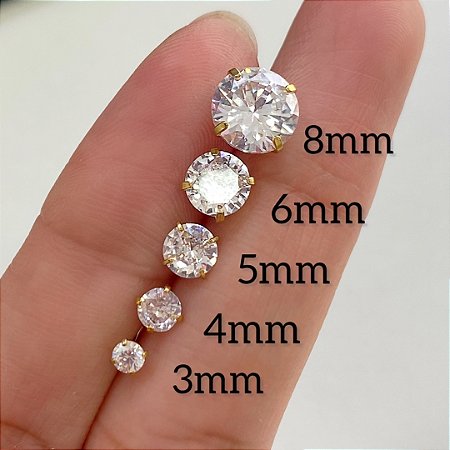 BRINCOS AÇO PONTO DE LUZ 4 GARRAS