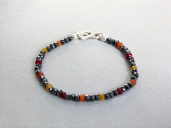 PULSEIRA HEMATITA E PEDRAS VARIADAS
