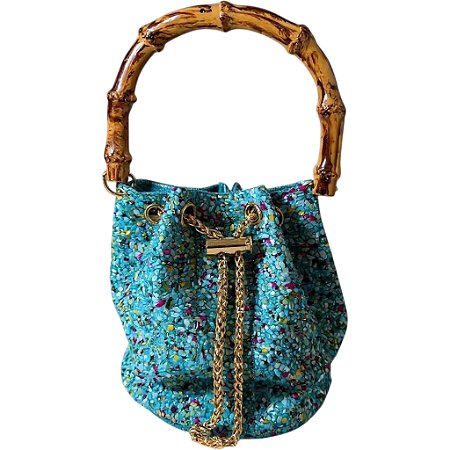 Bolsa saco de mão com pedras azuis