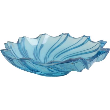 Fruteira de vidro azul.