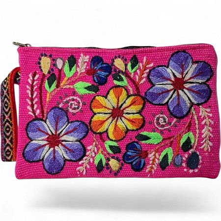 Bolsa de mão cor pink com flores bordada.