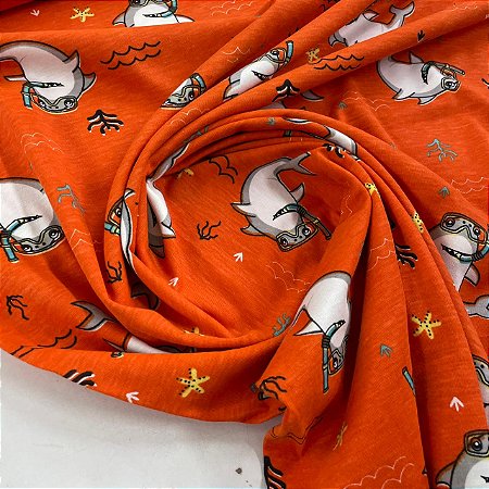 Malha de Algodão Estampada Tubarões Fundo Laranja