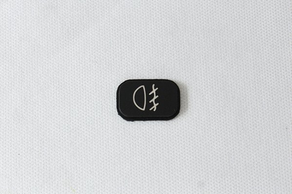 Tampa placa Simbolo Painel Scania 113/124 - Farol de Neblina