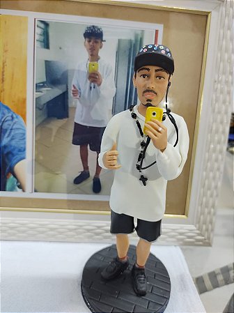 Escultura topo de bolo humanizado e personalizado em biscuit