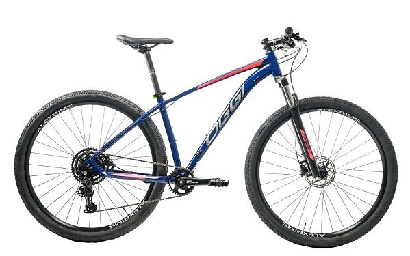 BICICLETA OGGI 29 BW 7.0 CUES 9V AZ/VERM 15,5 2026 - DCRE 2025/23616-0