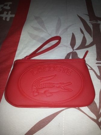 Clutch Lacoste Original.