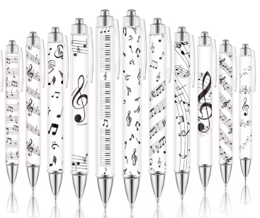 CANETA DE PLÁSTICO com símbolos musicais
