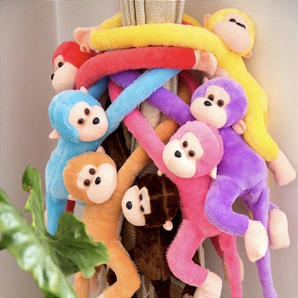 Macaco Pelúcia Com Som E Luz De Pendurar Antialérgico