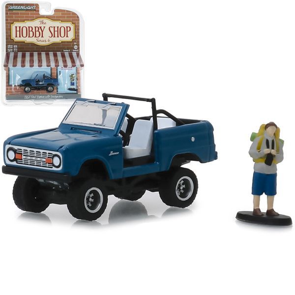 CARRO GREENLIGHT FORD BRONCO WITH BACKPACKER 1967 - 1/64