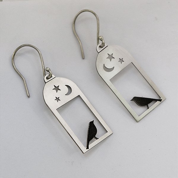 Brinco lanterna pássaro