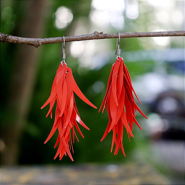 Brinco pena tecno laranja