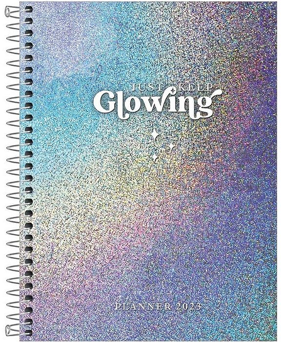 Agenda Planner Glow M7 Esp Tilibra 327018 O Planner Espiral 17,7 x 24 cm Glow 2023 com visões anual, mensal e semanal, capa dura brilhante, acabamento em espiral branco, miolo com 80 folhas, adesivos e bolsa de papel para guardar documentos.