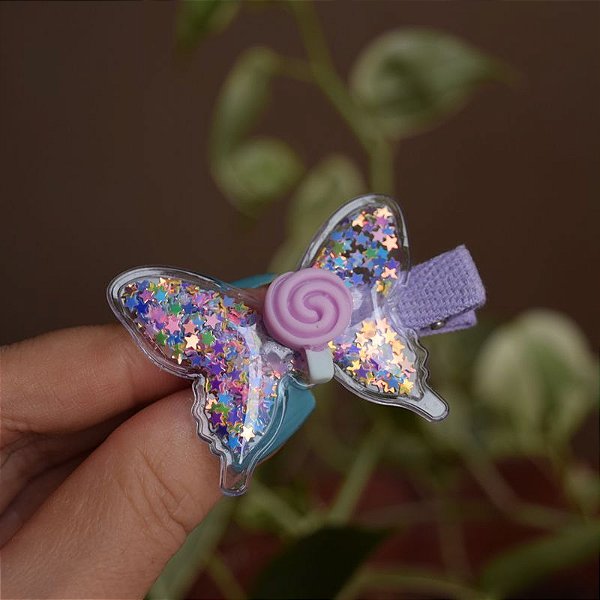 Presilha bico de pato infantil borboleta transparente com pirulito