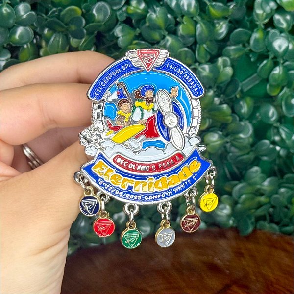 ARGANÉU/PRENDEDOR DE LENÇO GIRATÓRIO CAMPORI APL DECOLANDO PARA A ETERNIDADE 2025