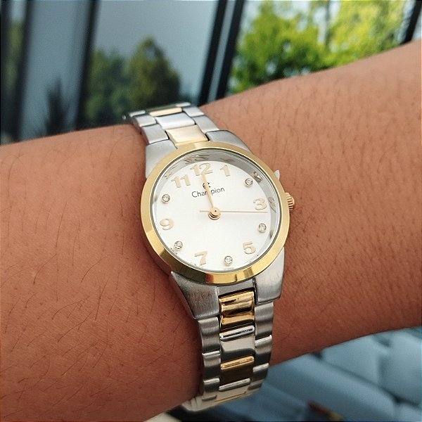 Relogio feminino champion prata com dourado CH26846S