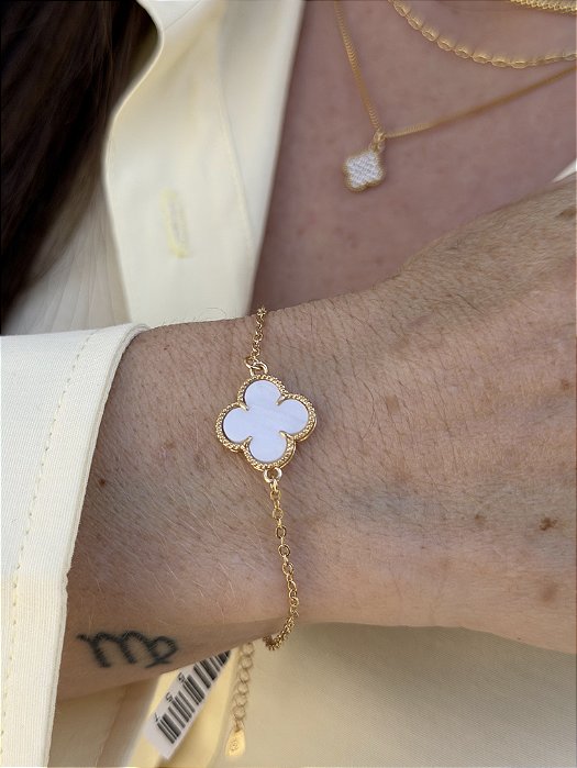 Pulseira trevo esmaltado dourado