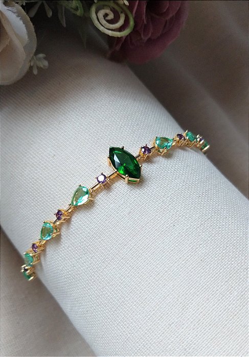 PULSEIRA BANHADA A OURO COM ZIRCÔNIAS VERDES E LILÁS