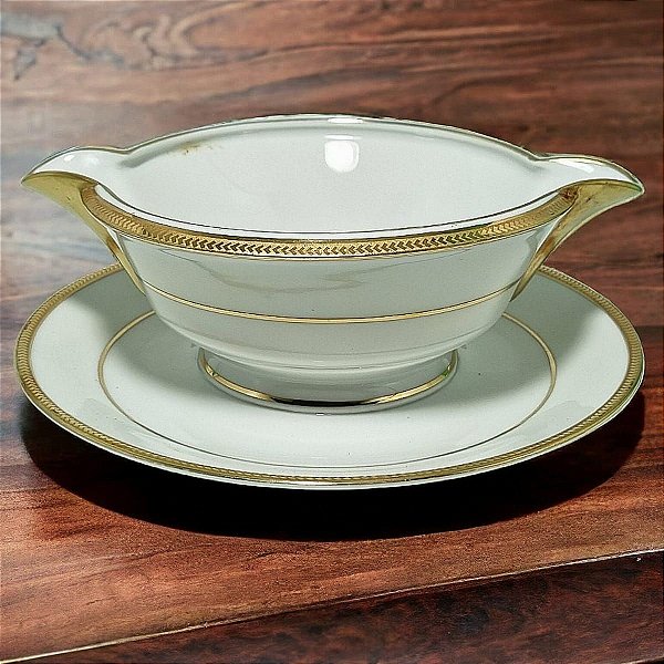 Molheira em porcelana Limoges branca filetada a ouro.