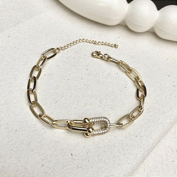 Pulseira Inspiração T Cravejada Banhada em Ouro