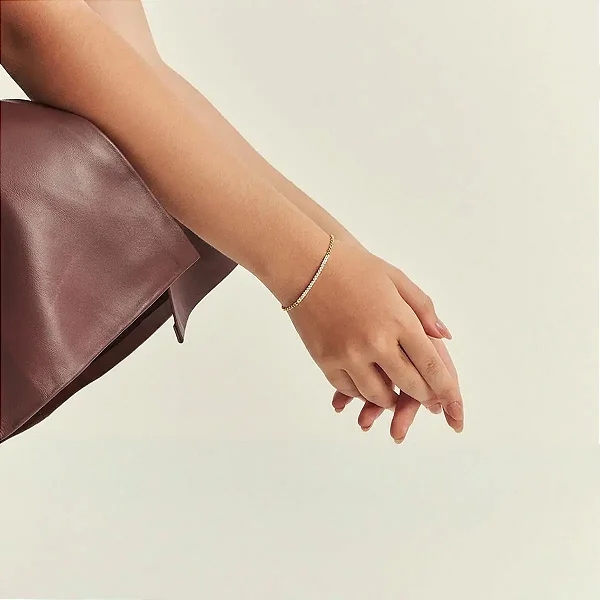Pulseira com Fileira Curva de Zircônias Dourada
