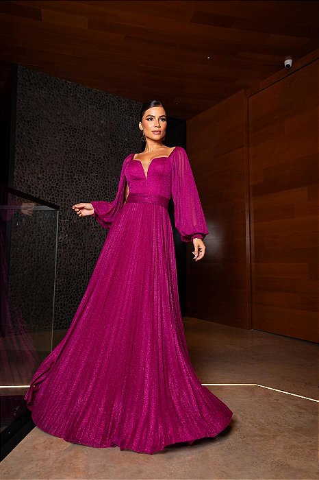 VESTIDO LONGO MICROTULE C/GLITTER MANGA LONGA SAIA PLISSADA DECOTE EM TULE FUCSIA
