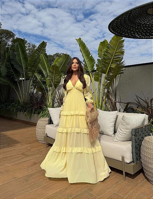 VESTIDO LONGO CHIFON MANGA LONGA COM BABADO NA SAIA AMARRAÇÃO COSTAS AMARELO MANTEIGA