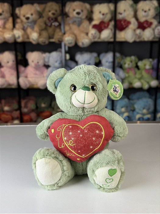 Urso pelúcia com coração cor verde -28cm
