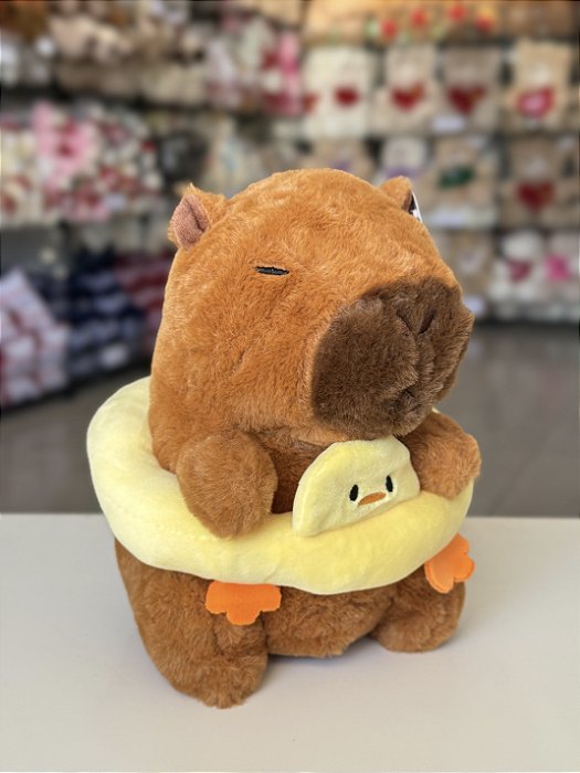 Capivara com boia amarela 22cm