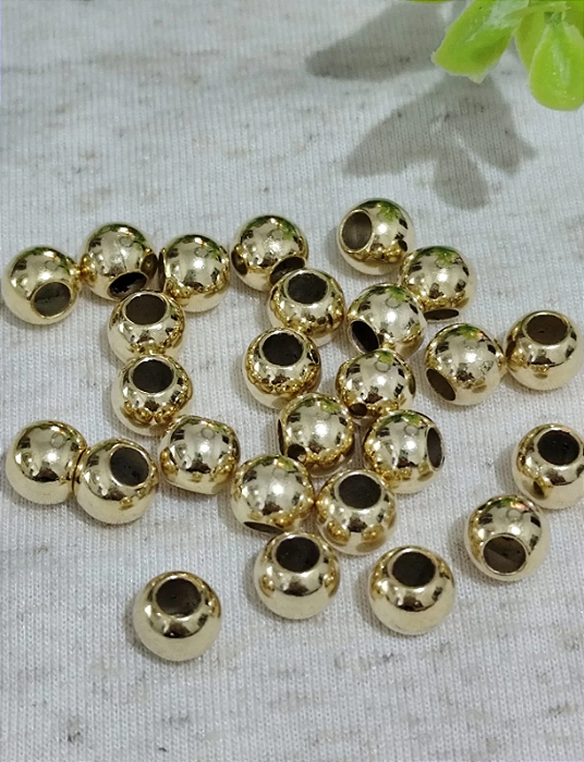 Bolinha ABS 6mm Ouro Furo Grande (10gr - Aprox. 50un)