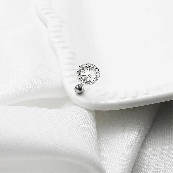 Piercing Prata Símbolo Paz Cravejado