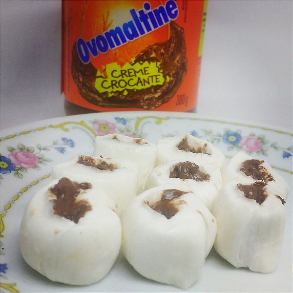 Pote de 100 g Tradicional com recheio de Ovomaltine com 15 a 20 balas