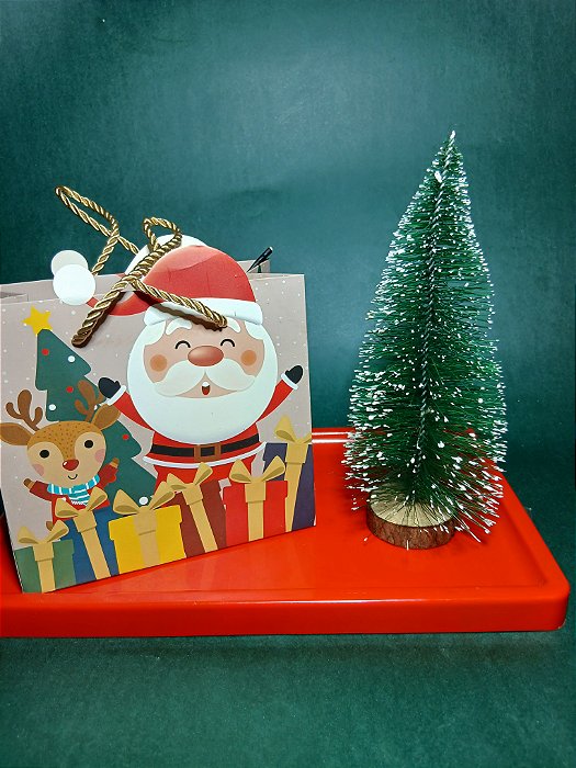 Unidade da sacolinha de presente natalina 15,5 cm x 7 cm x 14,3 cm com 15 balas de raspas de limão comum e raspas de limão siciliano com cartão impresso de brinde