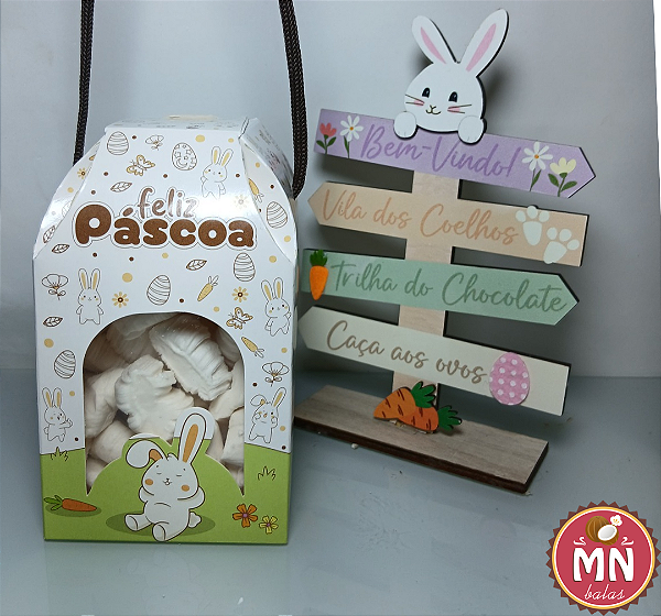 Unidade da caixa casinha com alça de Páscoa 8 cm x 8 cm x 14 cm com 20 balas de coco tradicionais sem recheio