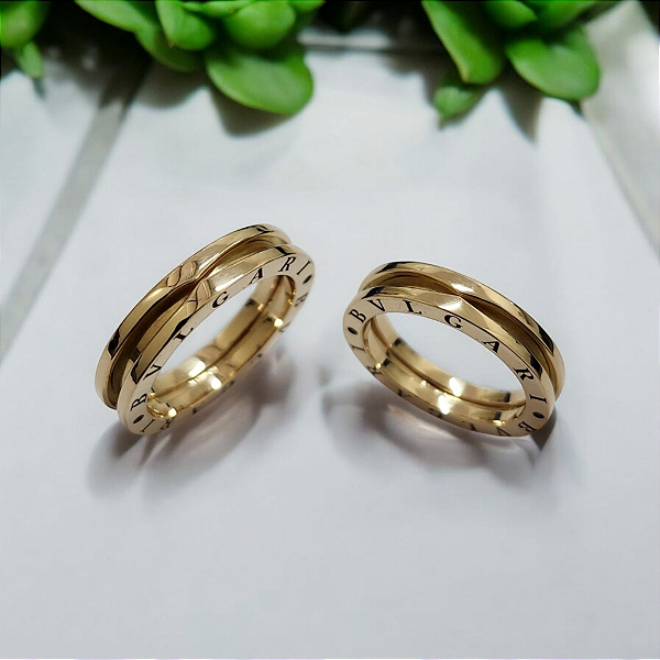 PAR DE ALIANÇAS PESANDO 14 GRAMAS DE OURO AMARELO 18K TIPO BVLGARI
